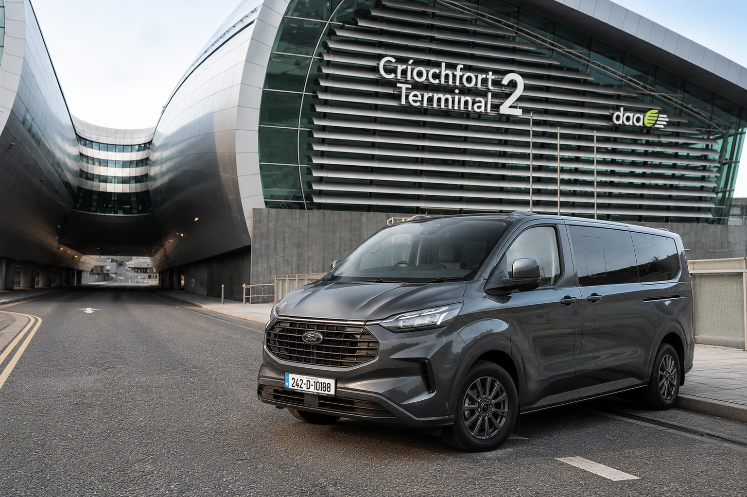 JMC Airport Transfers Ford Tourneo 8-seater minibus outside Dublin Airport Terminal 2